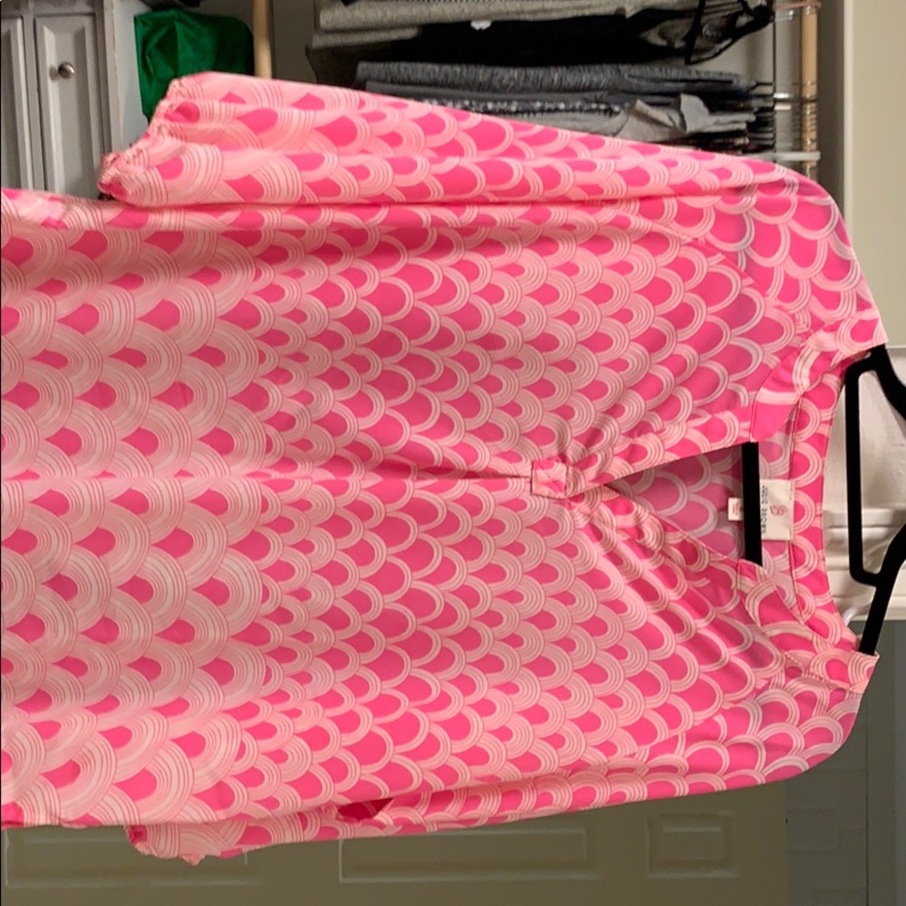 Pink patterned v neck shirt